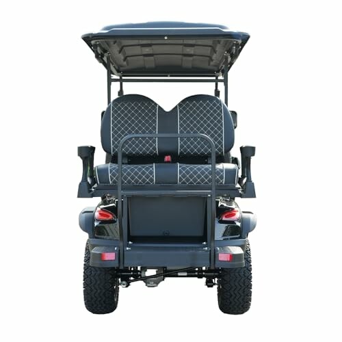 Rear view of a golf cart with diamond-patterned seats.