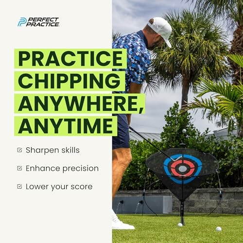 Man practicing golf chipping with target net outdoors.