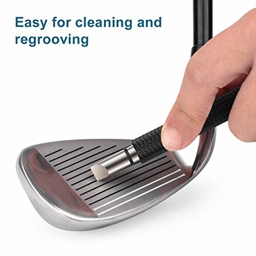 Hand using tool to clean golf club grooves.