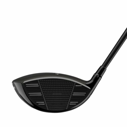 Close-up of a black golf club driver head