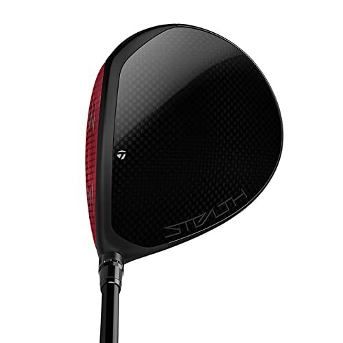 Close-up of a black and red golf driver head