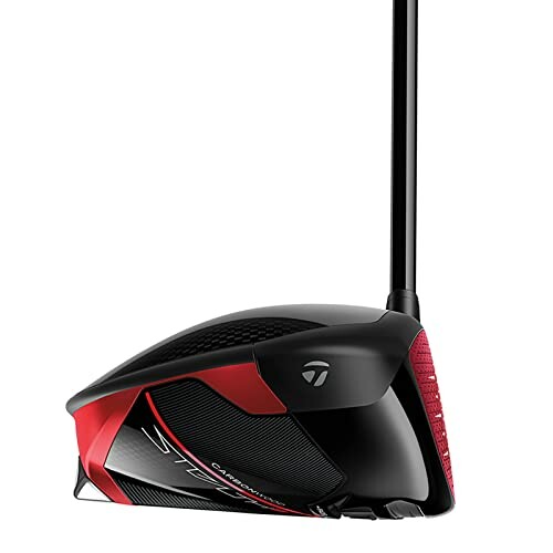 Close-up of a modern golf driver club with black and red design