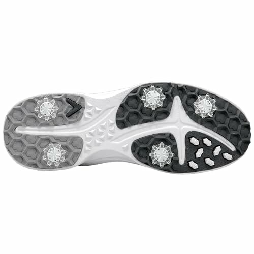 Golf shoe sole with spikes and textured pattern