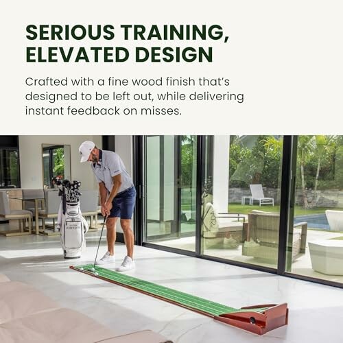 Man practicing golf putting indoors on a putting mat.