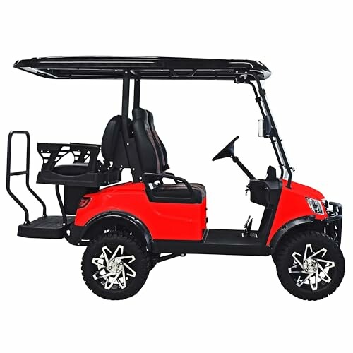 Red golf cart with black roof and seats, side view.
