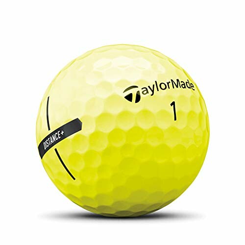 Yellow TaylorMade golf ball with logo and distance marker.